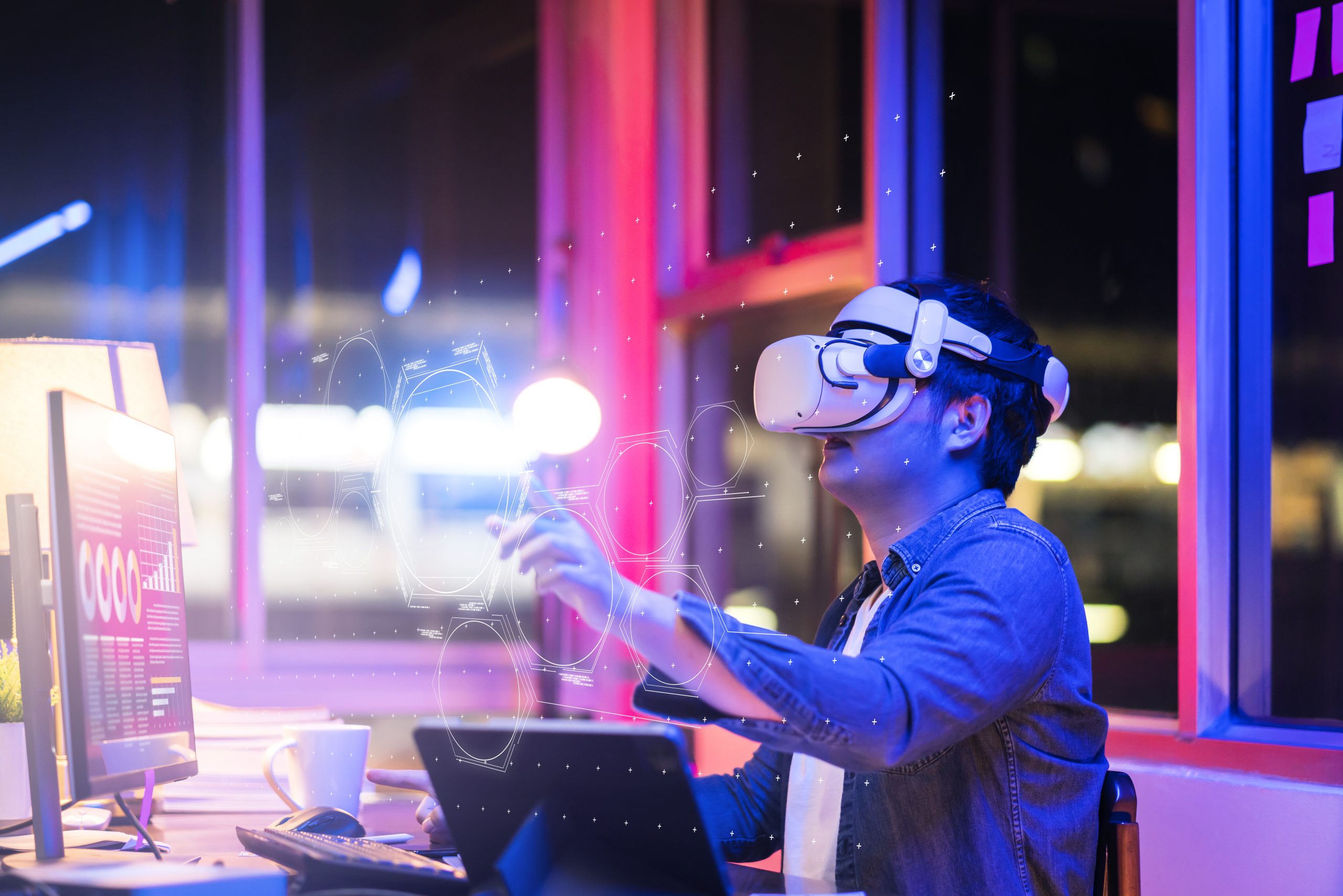 asian-young-male-wearing-wearable-goggle-headset-virtual-online-meeting-digital-space-working-with-3d-augmented-dimension-homecyber-virtual-working-with-virtual-vr-goggle-pc-desktop-device